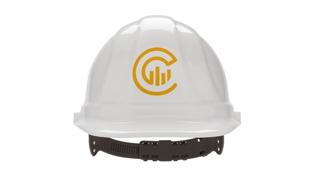 A white hard hat with a yellow Capacity Commercial logo on it.
