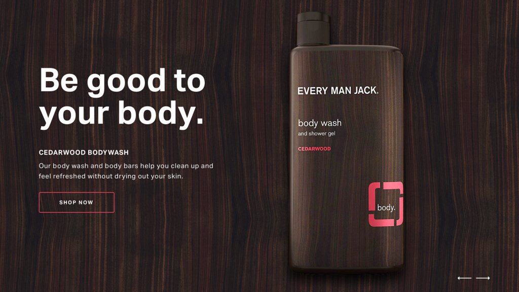 A website marquee image of a bottle of Every Man Jack body wash over top of a wood grain background.