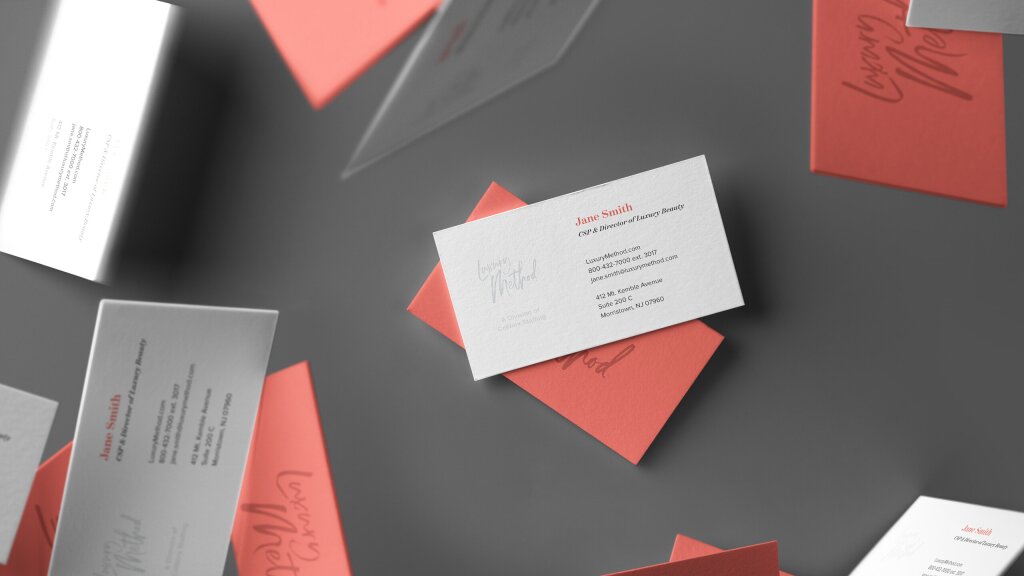 An image of falling business cards for Luxury Method.